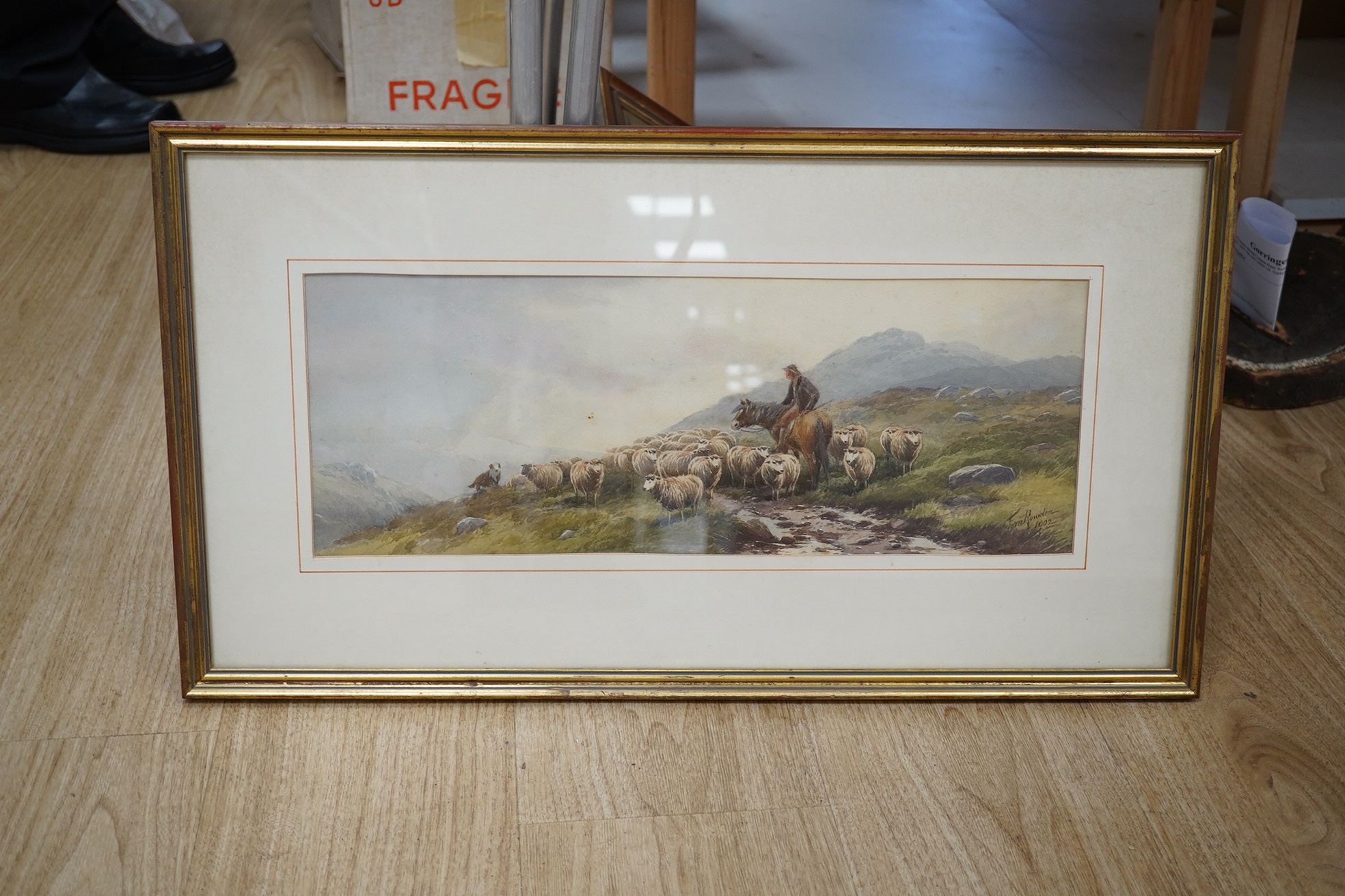 Tom Rowden (1842-1926), watercolour, Mountainous landscape with flock of sheep and shepherd, signed and dated 1902, 17 x 47cm. Condition - fair